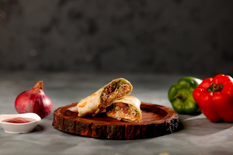 Veggie burrito packed with roasted peppers and black beans