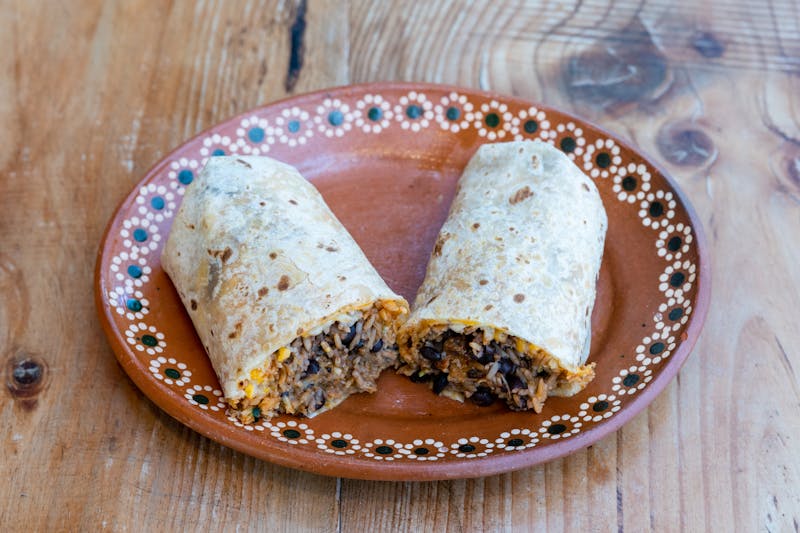 Costa Vida signature chicken burrito with fresh rice and beans