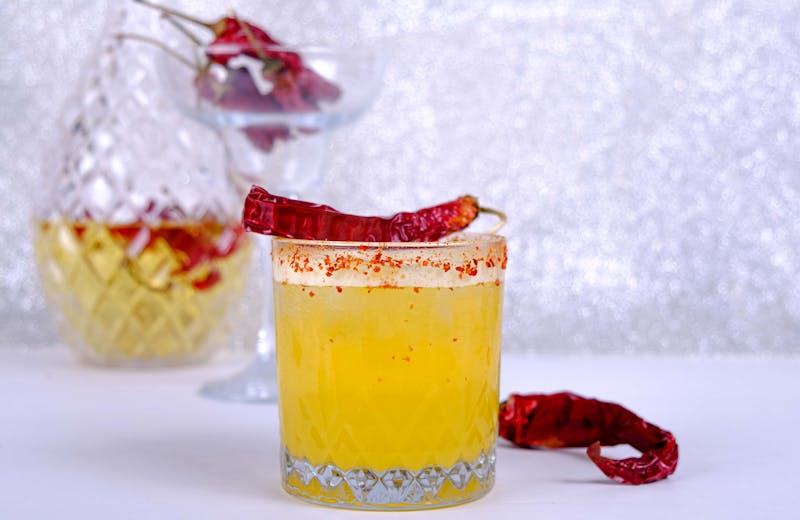 Fresh mango lime agua fresca with chili rim